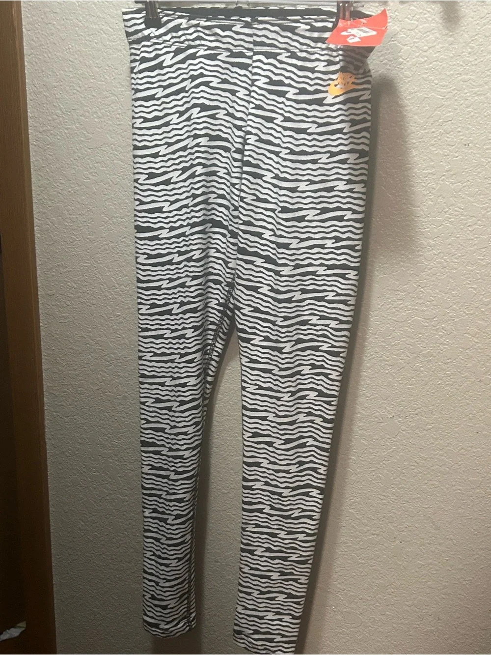 Nike Black and White Zebra Print Leggings with Orange Swoosh